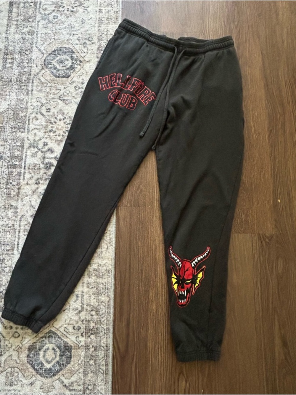 Netflix Black Hellfire Club Graphic Joggers with Red & Yellow Devil